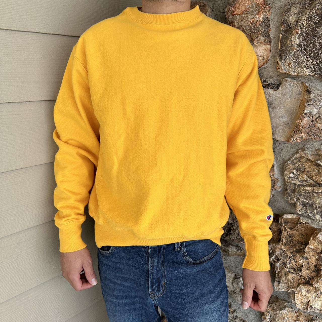 Yellow Champion pullover Model typically wears a... - Depop