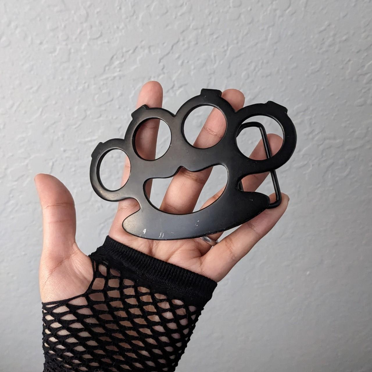 Black Brass Knuckle belt buckle. Will not come with... Depop