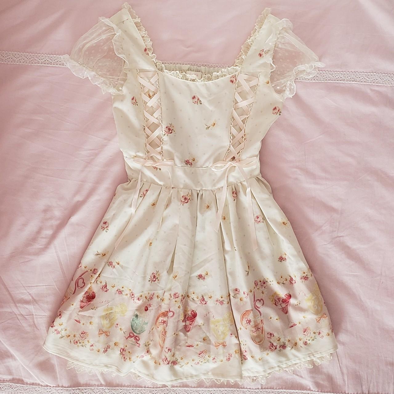 White lace-up Liz Lisa dress with an adorable floral... - Depop