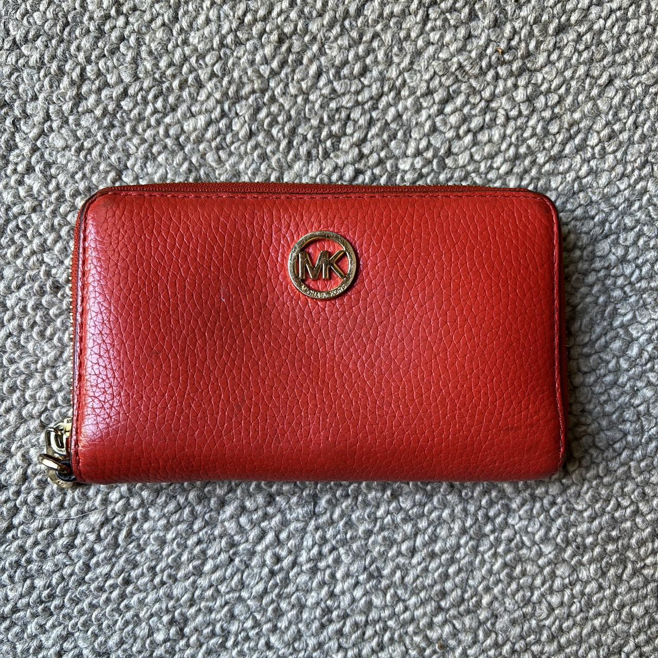 Bright red Michael kors wallet. Has minor signs of. Depop