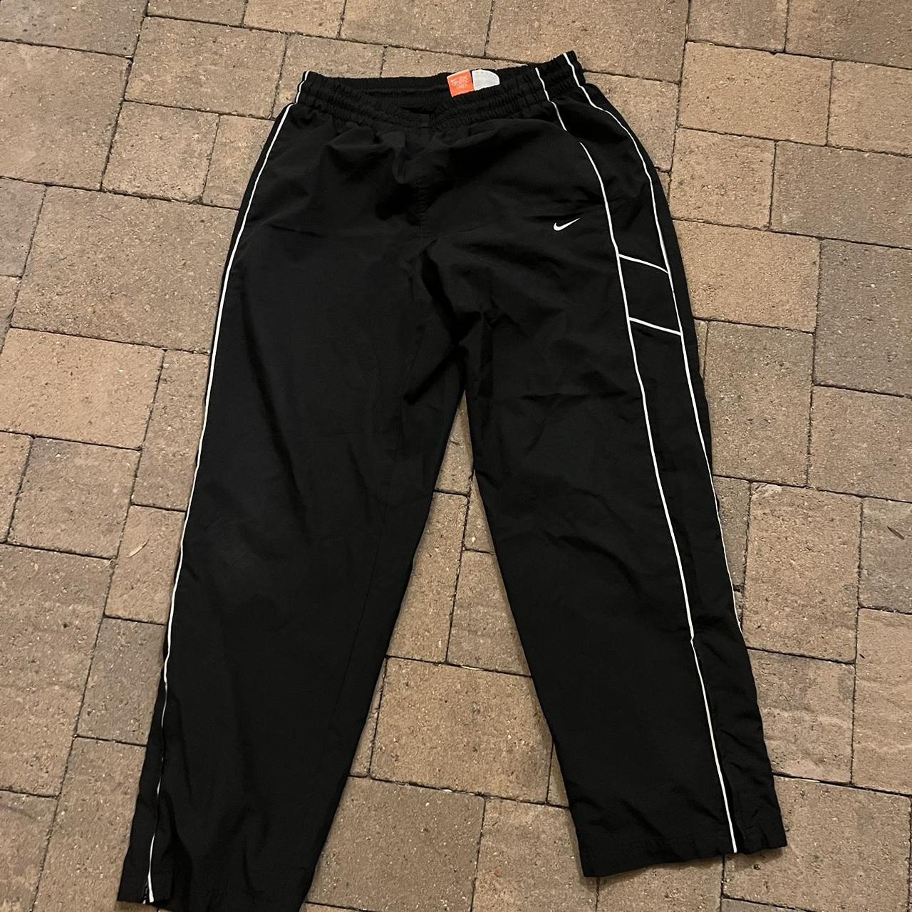 Vintage Nike athletic department track pants... Depop