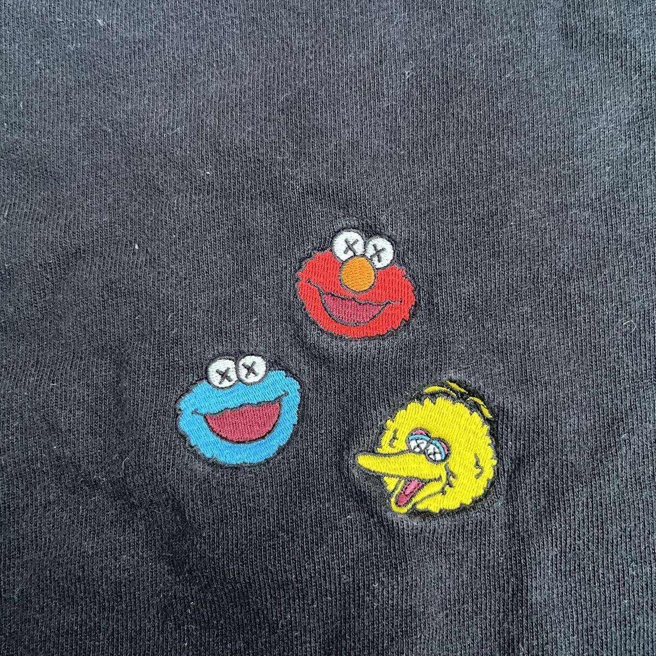 Kaws x uniqlo Sesame Street crew neck Size... - Depop