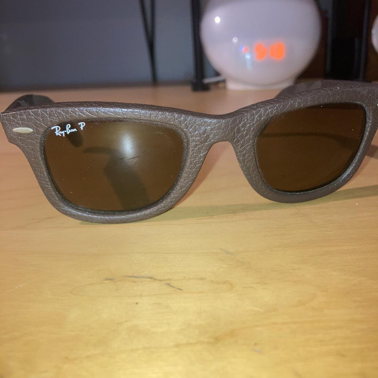 Lot including : - 1 pair of sunglasses RAYBAN - 1 pa… | Drouot.com