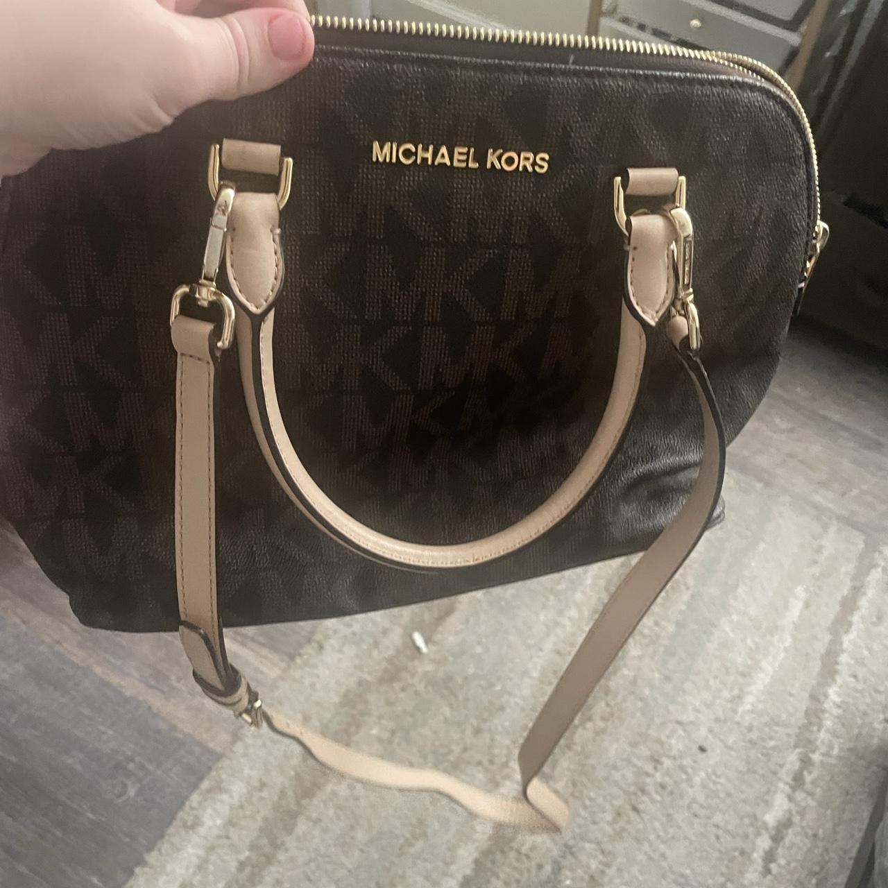 How do you clean hotsell a michael kors purse