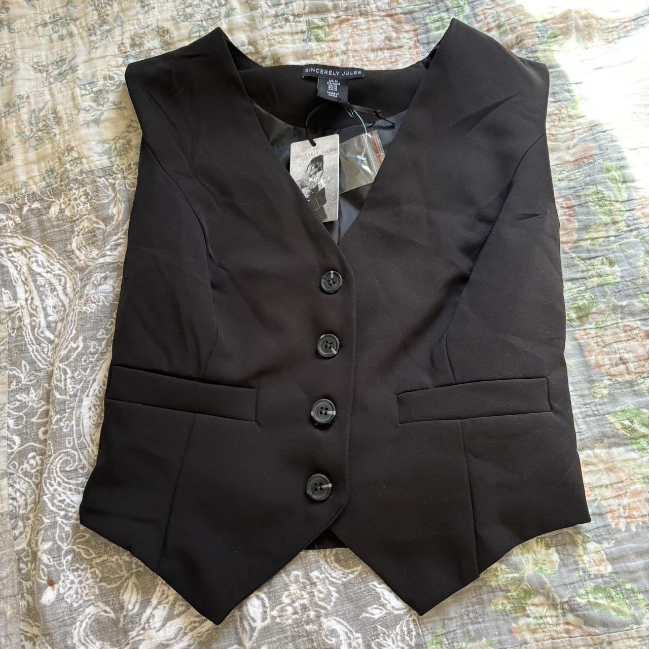 black vest top in a size medium, new with tags.... - Depop