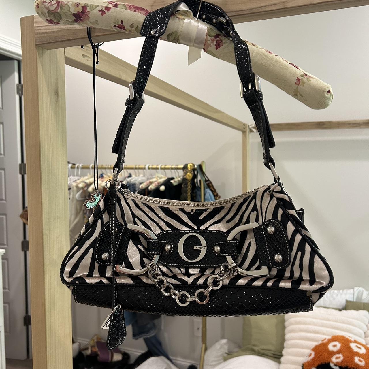 Adorable zebra print Guess bag! 🖤🖤🖤 Really cute... - Depop