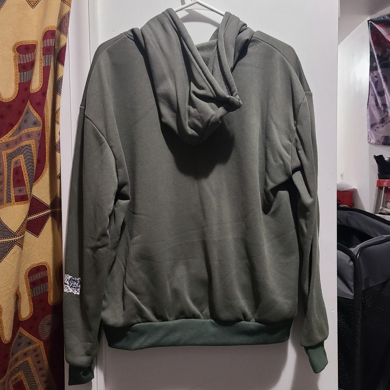 sage green zip up hoodie with patches. fits like a... - Depop