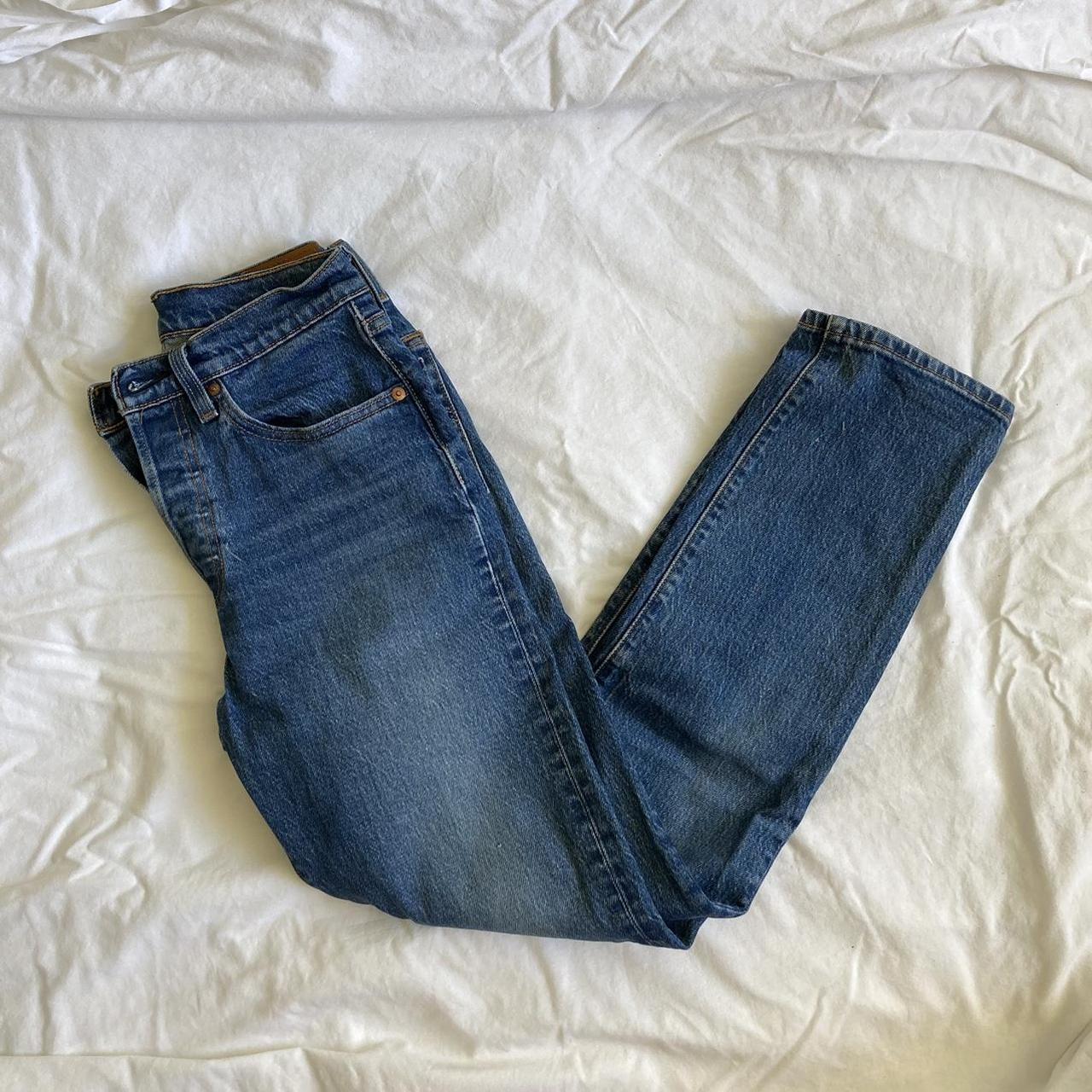 Dark blue Levi 501 jeans with small rip in left knee... - Depop