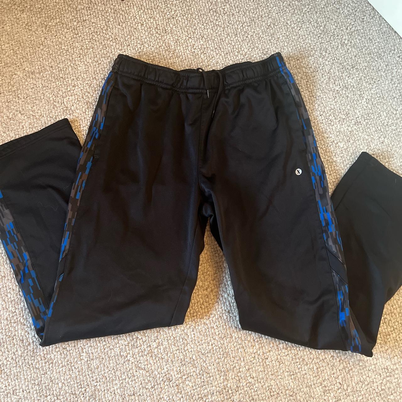 Blue and black Xersion activewear pants with - Depop