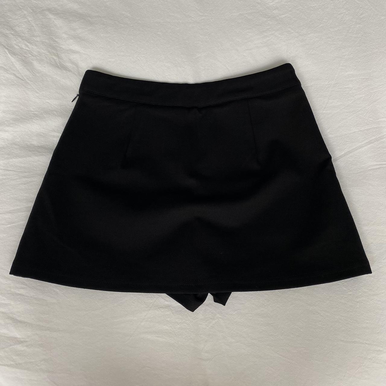 Black mini skort Super flattering & thick... - Depop