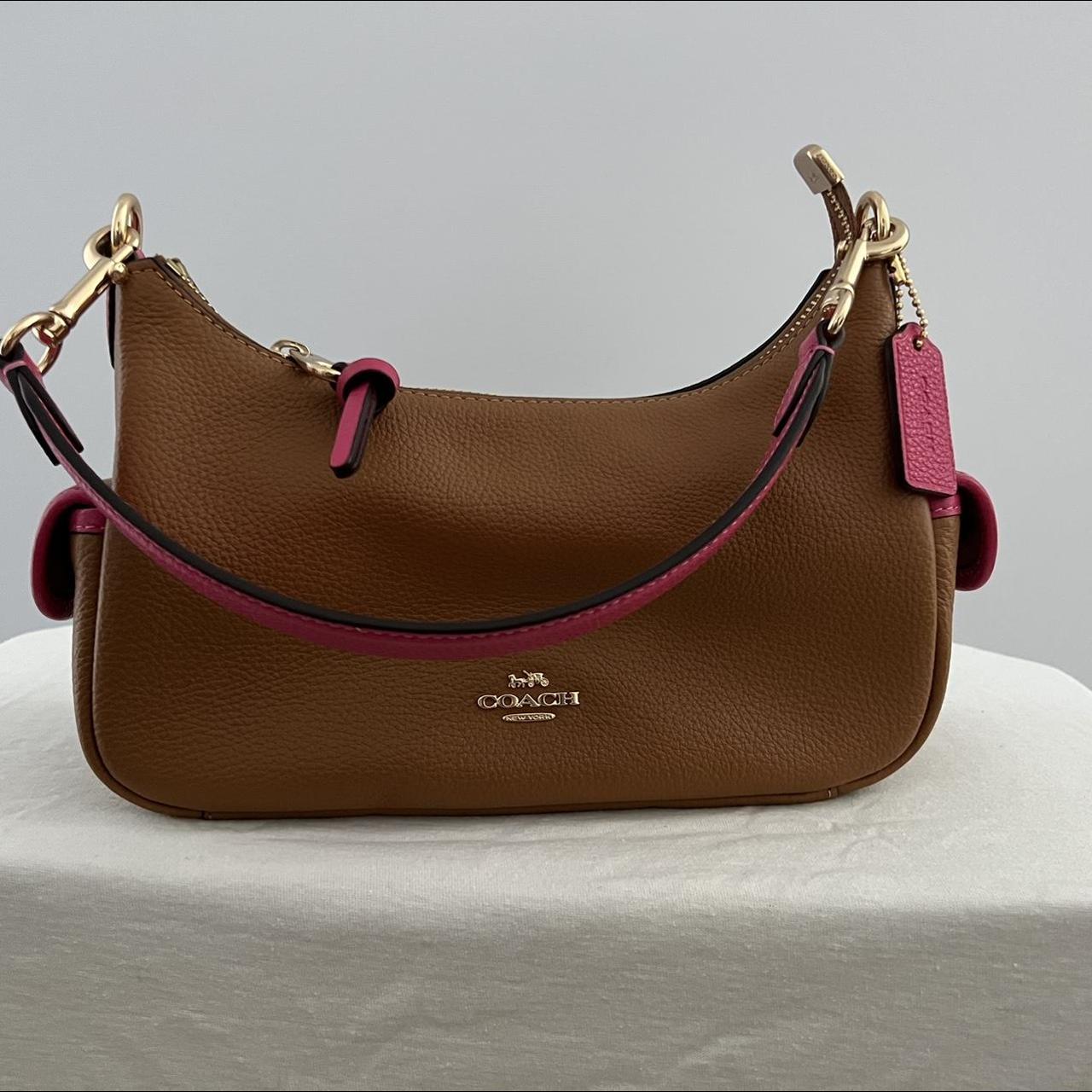 Coach shoulder bag. Brown with pink accents. Strap Depop