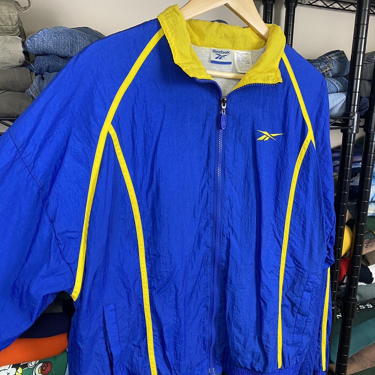 Vintage Reebok 90s jacket Blue and yellow track... - Depop