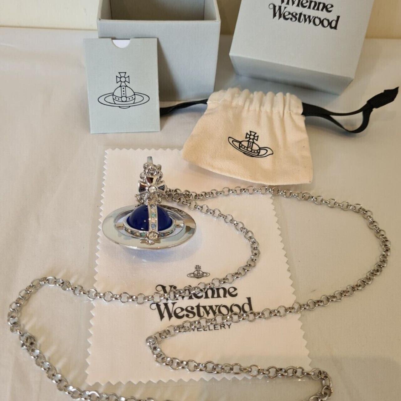 Vivienne Westwood large silver tone 3D Orb pendant... - Depop