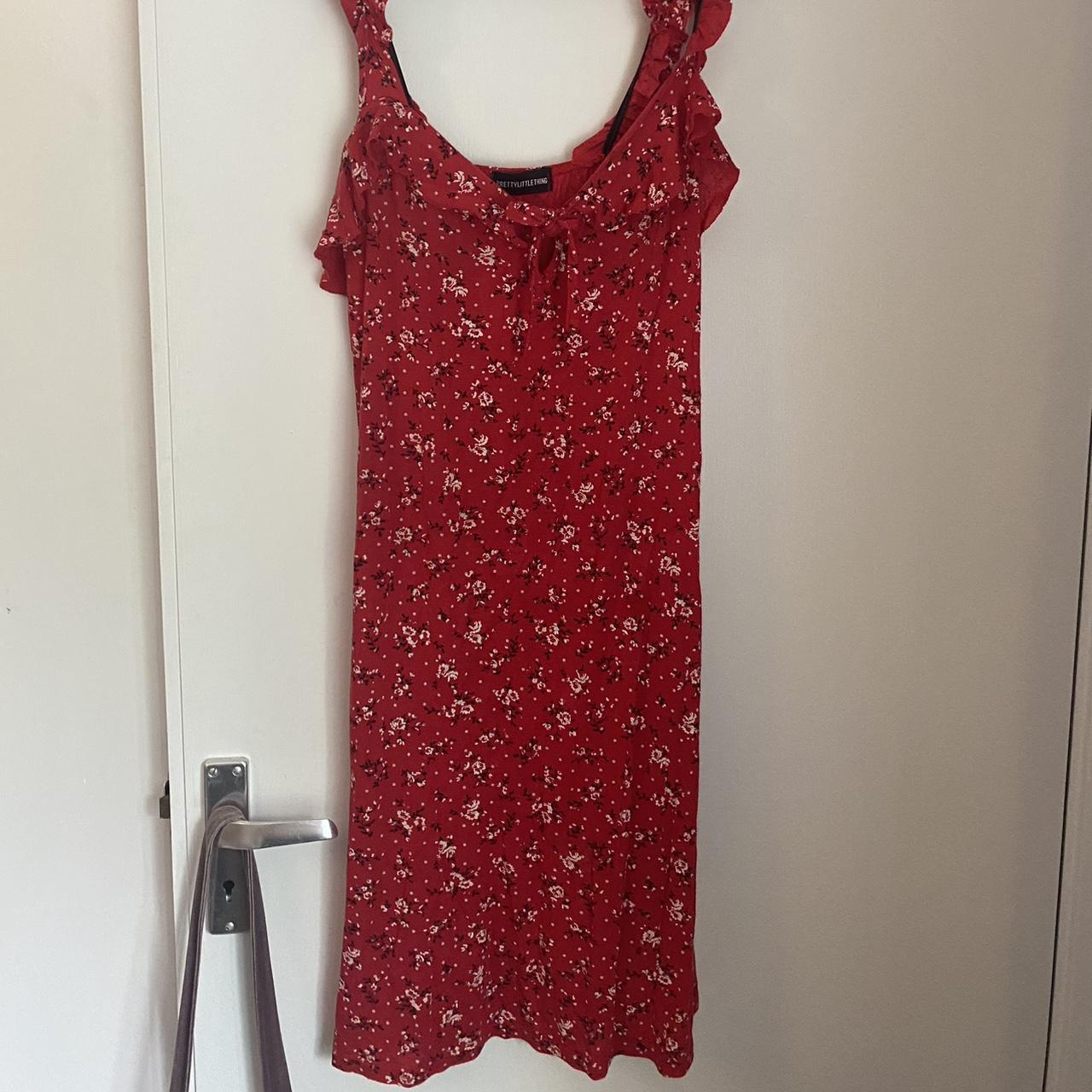 Floral red midi dress, best fits size 10, great... - Depop