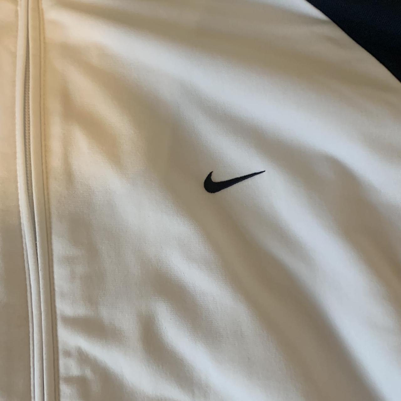 Mens Nike track jacket. White track jacket with blue... Depop