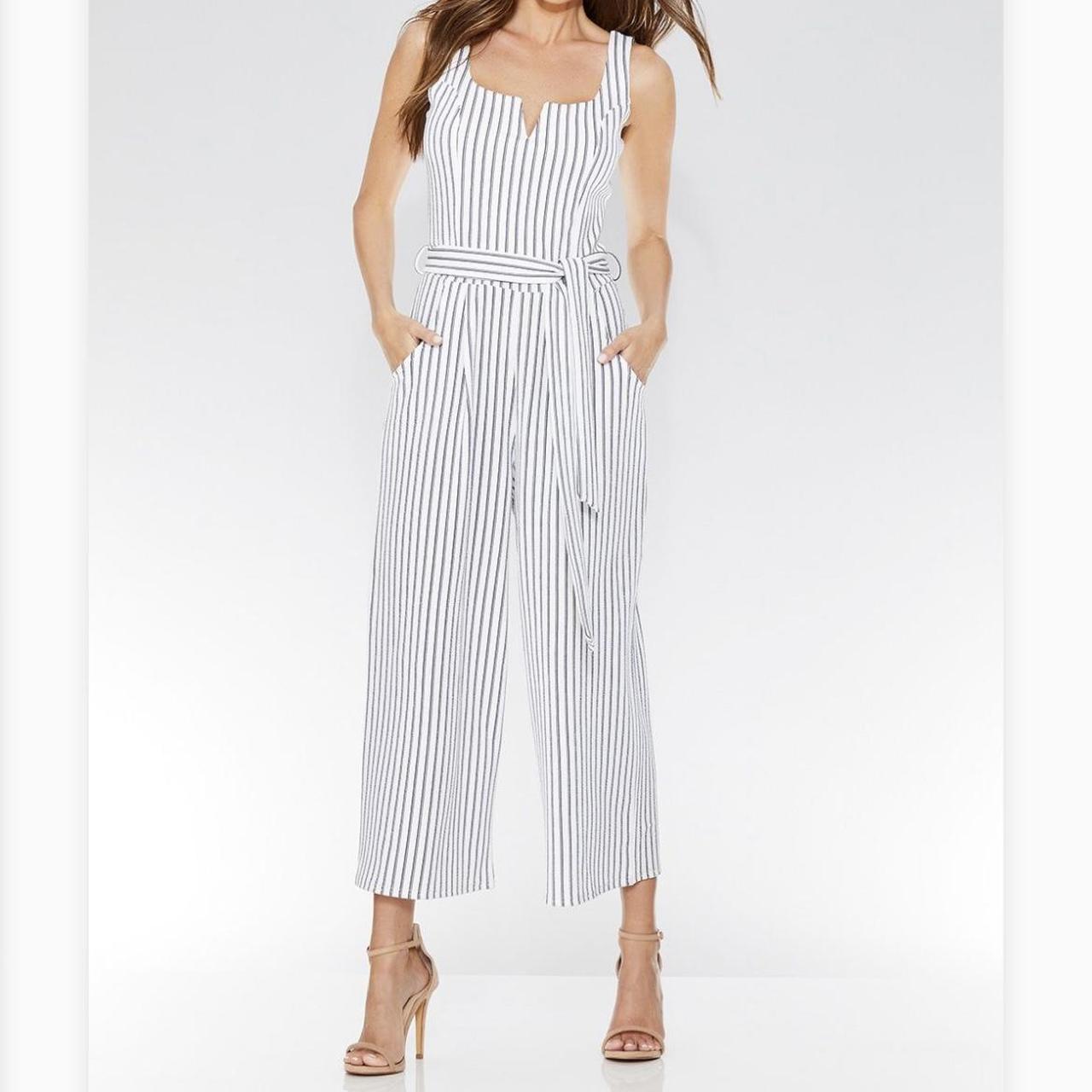 White and black stripy jumpsuit from Quiz in size 8... Depop