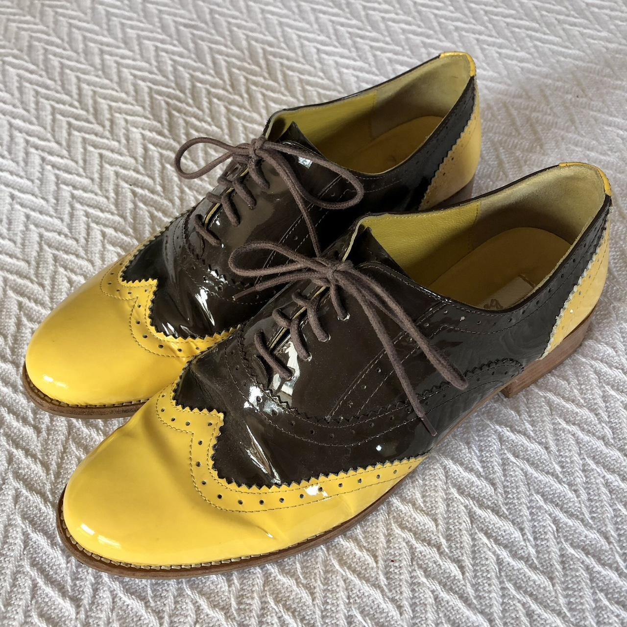 Yellow and brown brogues with a slight heel. From. Depop