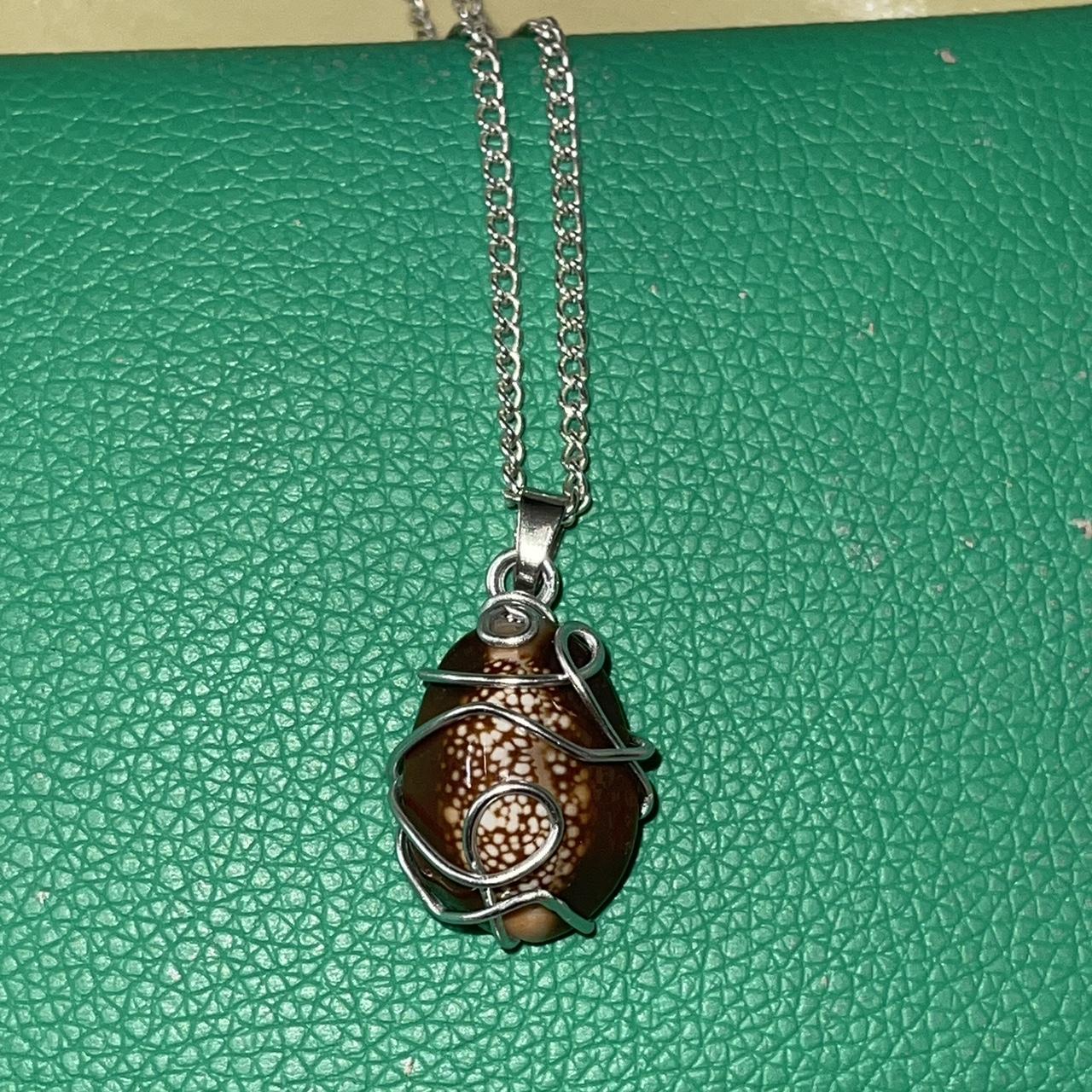 Brown seashell wire wrap necklace pendant on silver... Depop