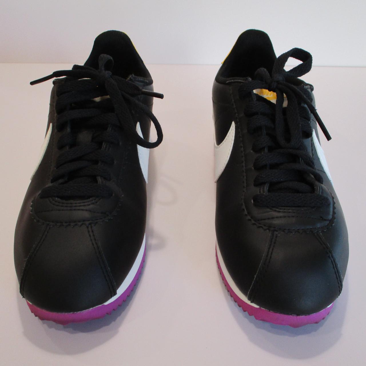 ladies black nike cortez