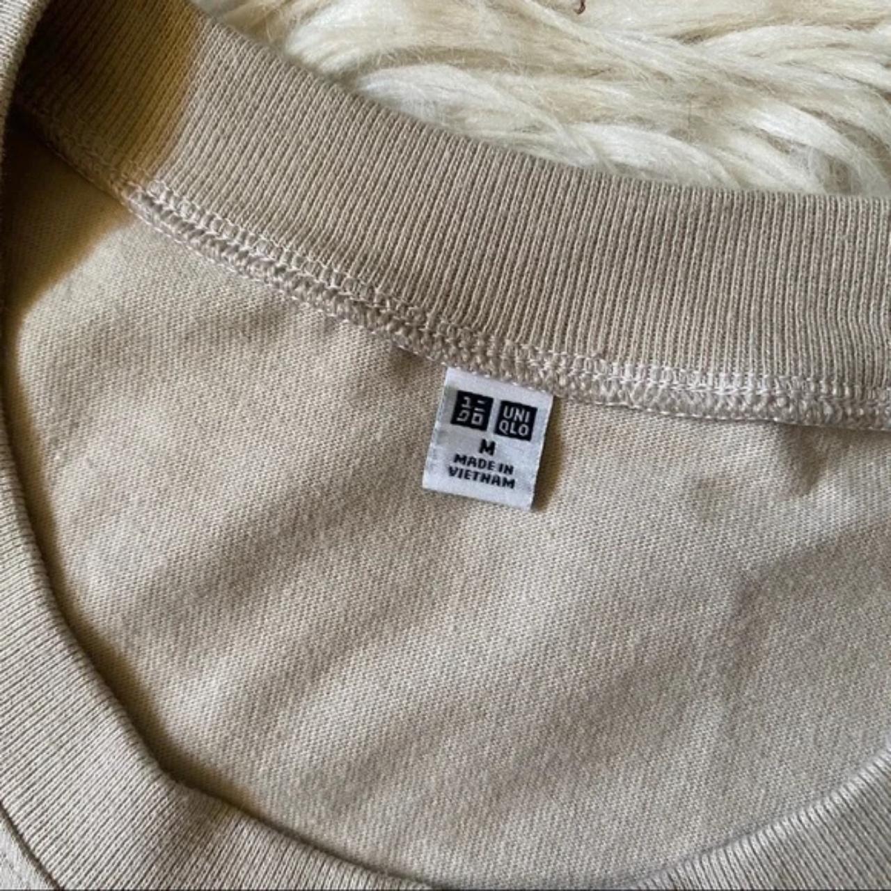 Uniqlo Solid Beige Tan Tee Shirt. It has slit hems... - Depop