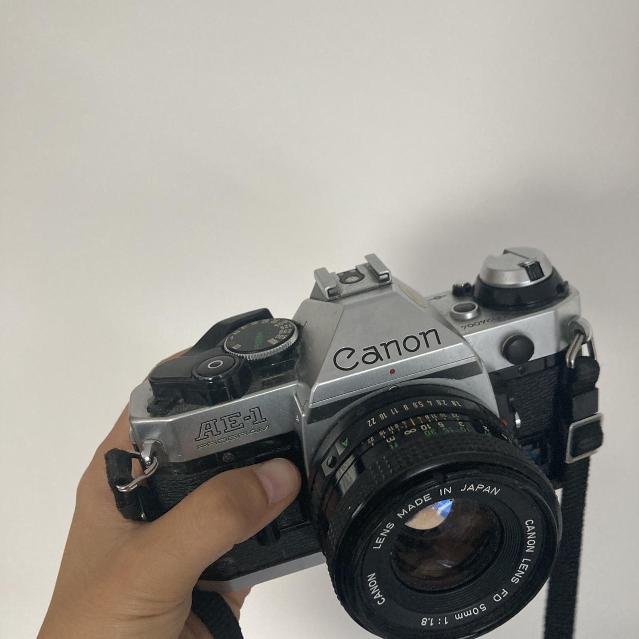 Canon AE1 in perfect working condition Takes 35mm... Depop