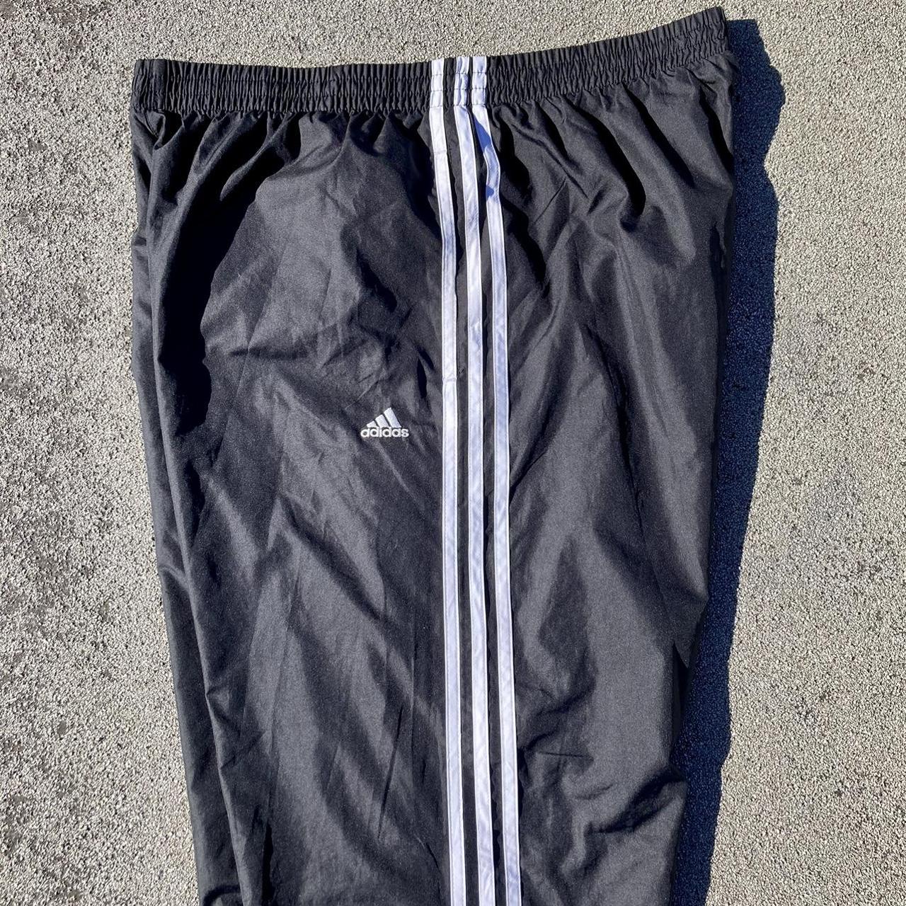 Adidas wind breaker track pants. Size XL. Draw... - Depop