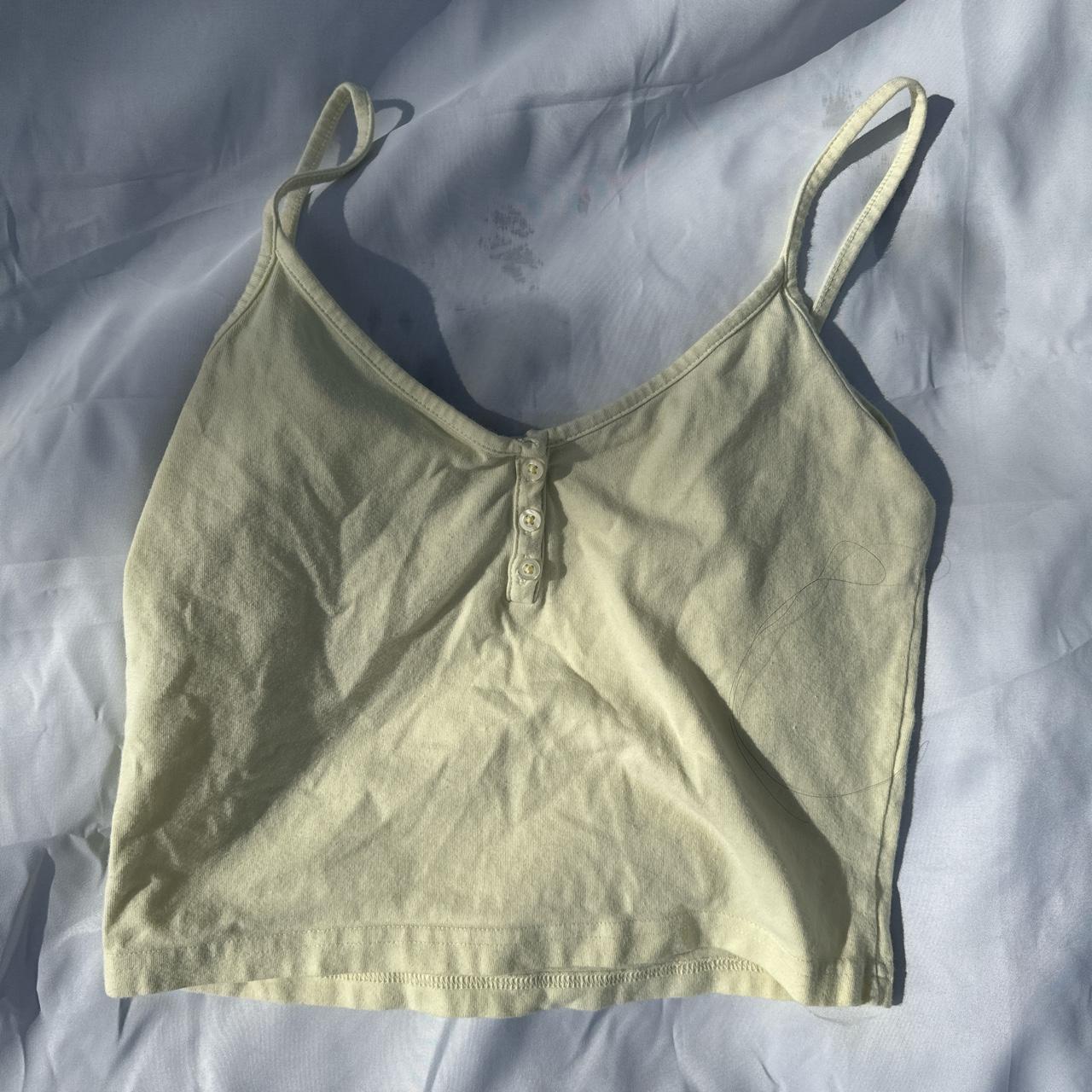 brandy melville yellow button tank top shipping is... Depop