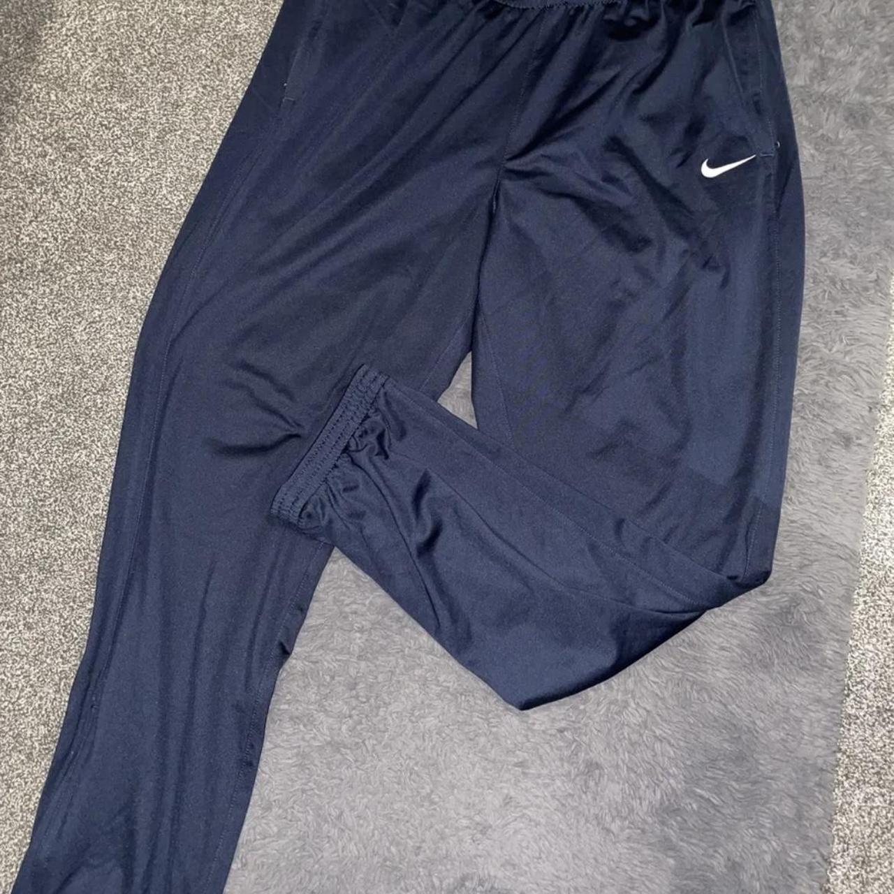 Women's Nike tracksuit bottoms / joggers Navy blue - Depop