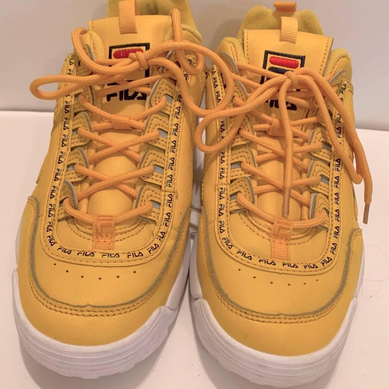 Fila yellow disruptor ii best sale leather trainers