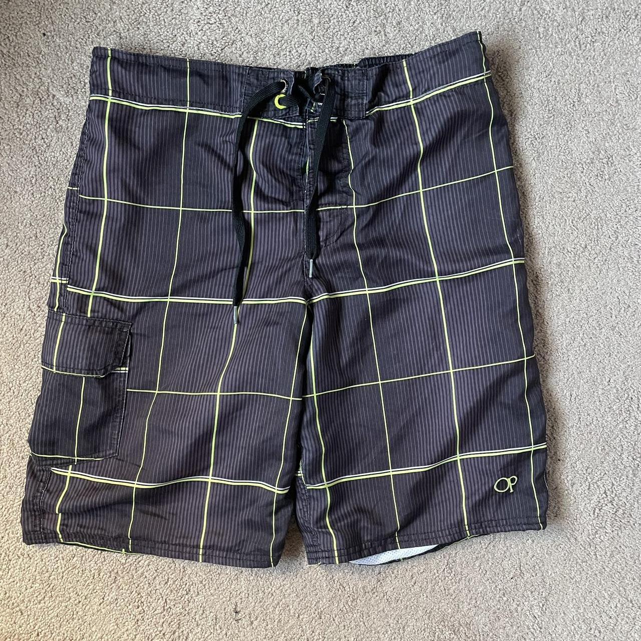 men’s green and black swim shorts lightly... - Depop