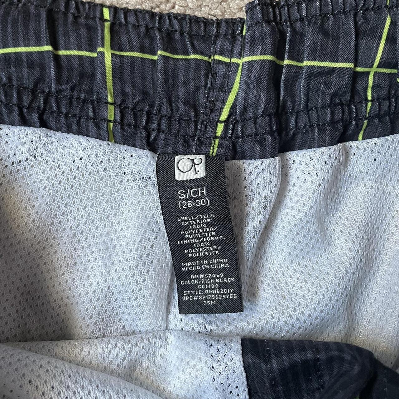 men’s green and black swim shorts lightly... - Depop