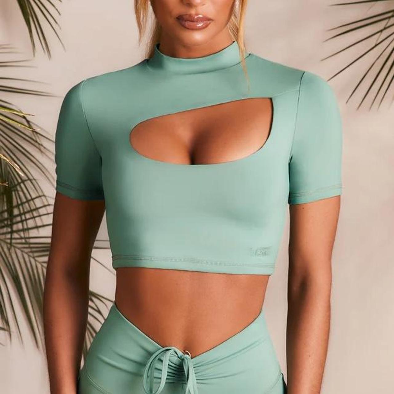 Bo+Tee Power Up Slinky Cut Out Crop Top in Sage - Depop