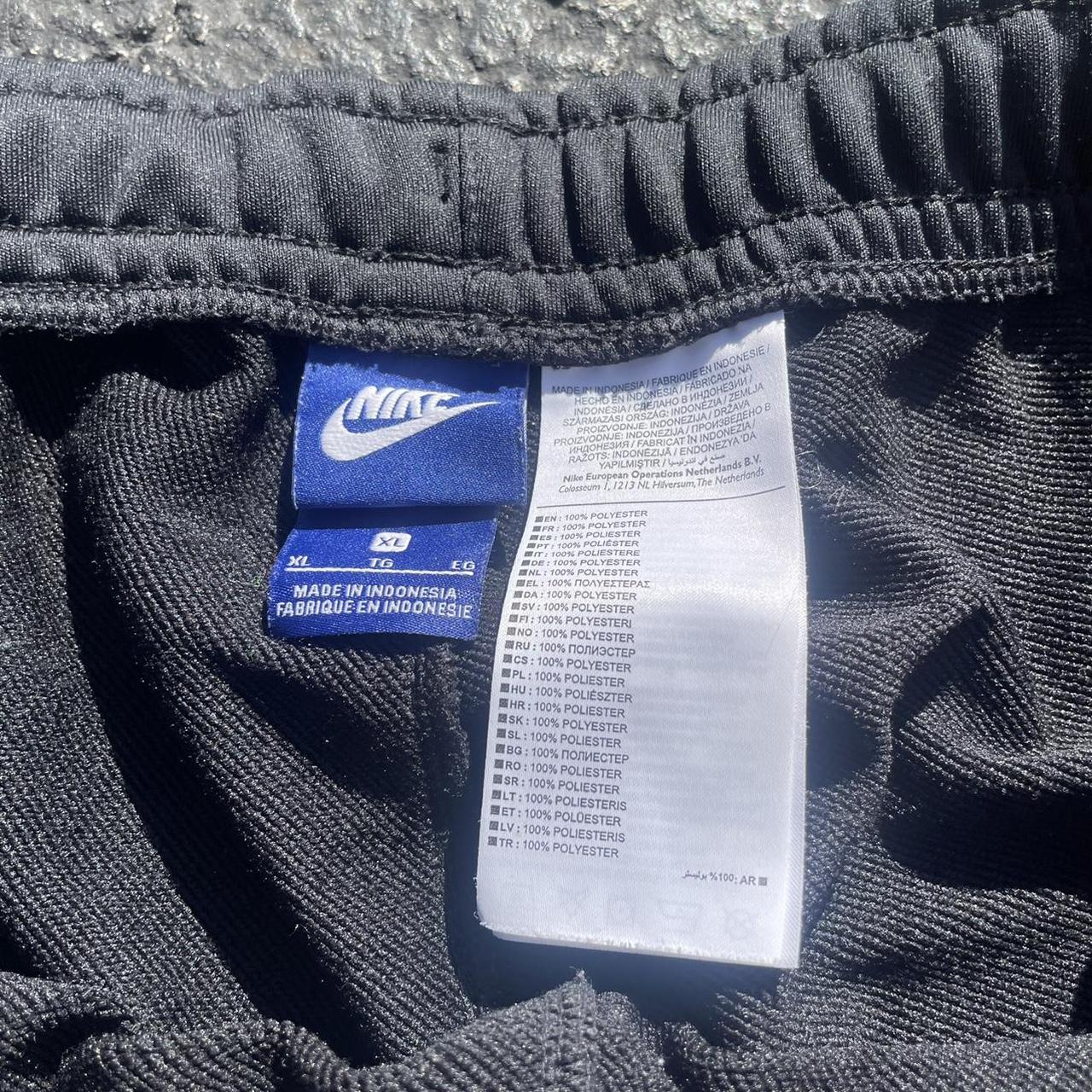 cuffed nike track pants