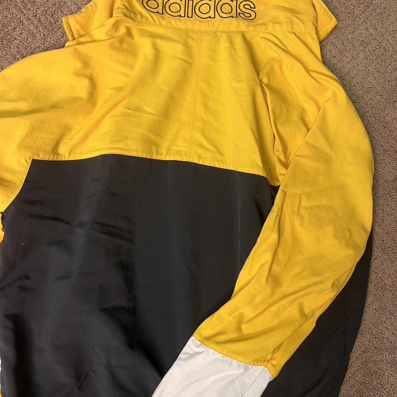 Black adidas jacket 2024 with yellow stripes