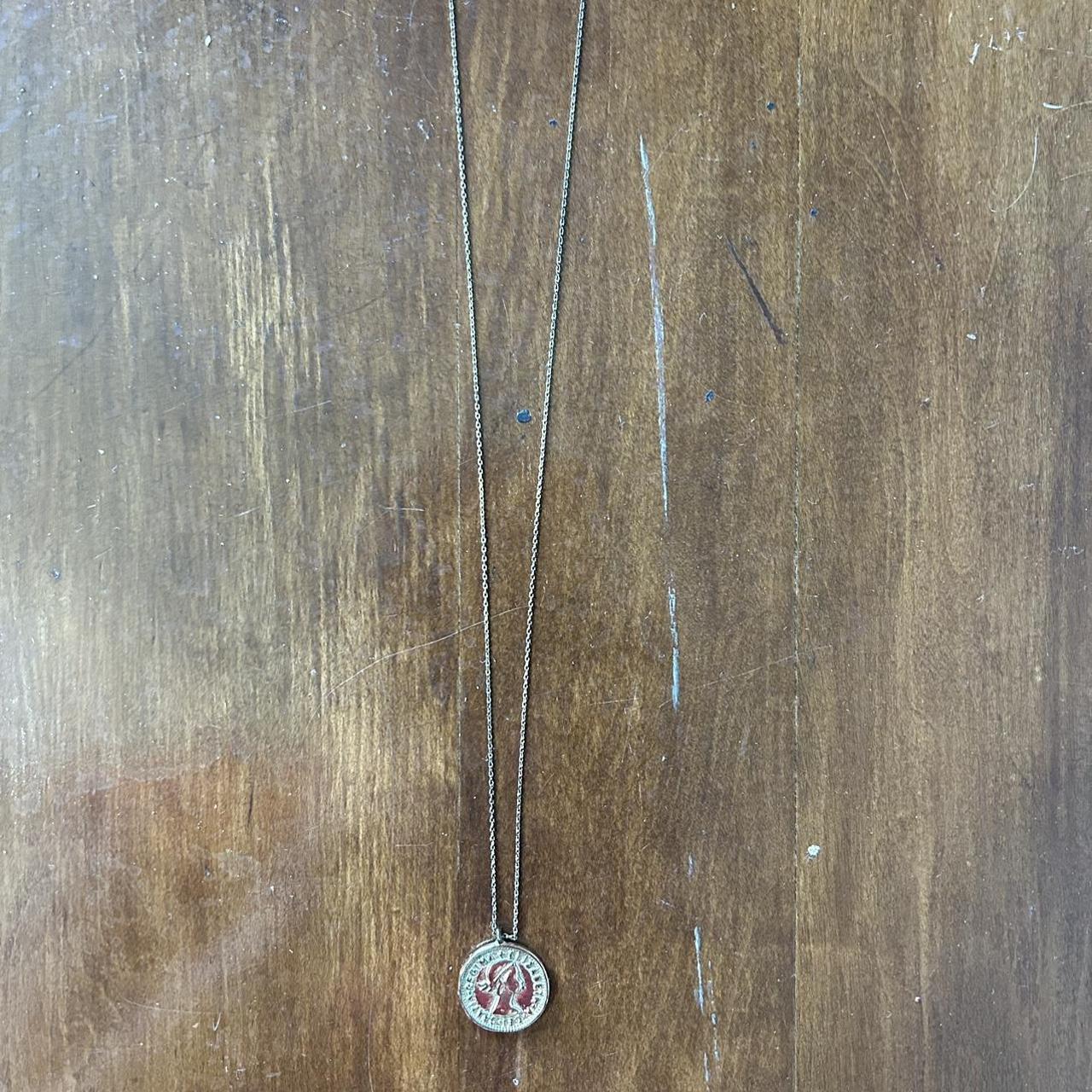 Brandy Melville “gold queen coin