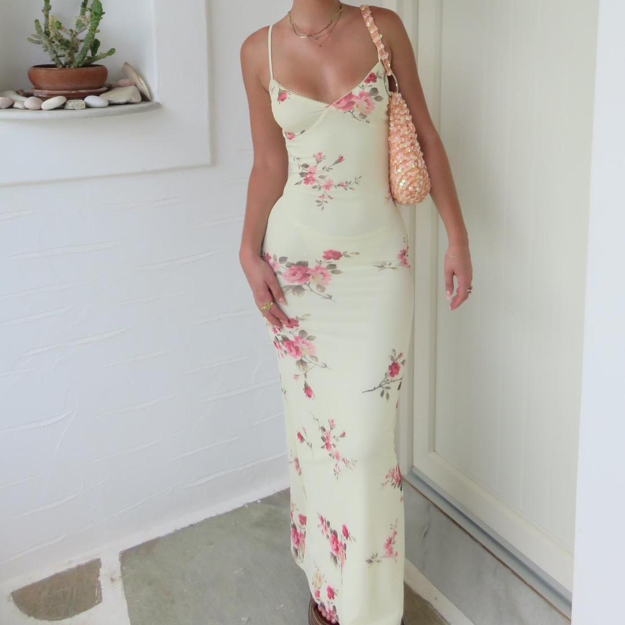 Yellow maxi dress with pink floral detailing Small... Depop