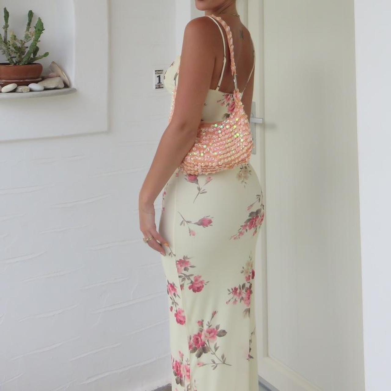 Yellow maxi dress with pink floral detailing Small... Depop