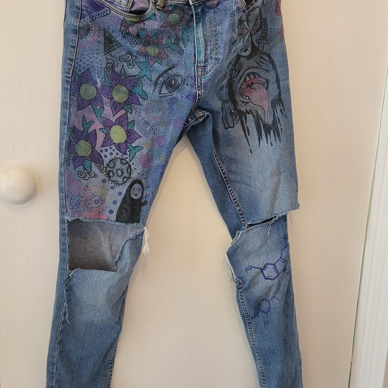 Jeans with art on hot sale them