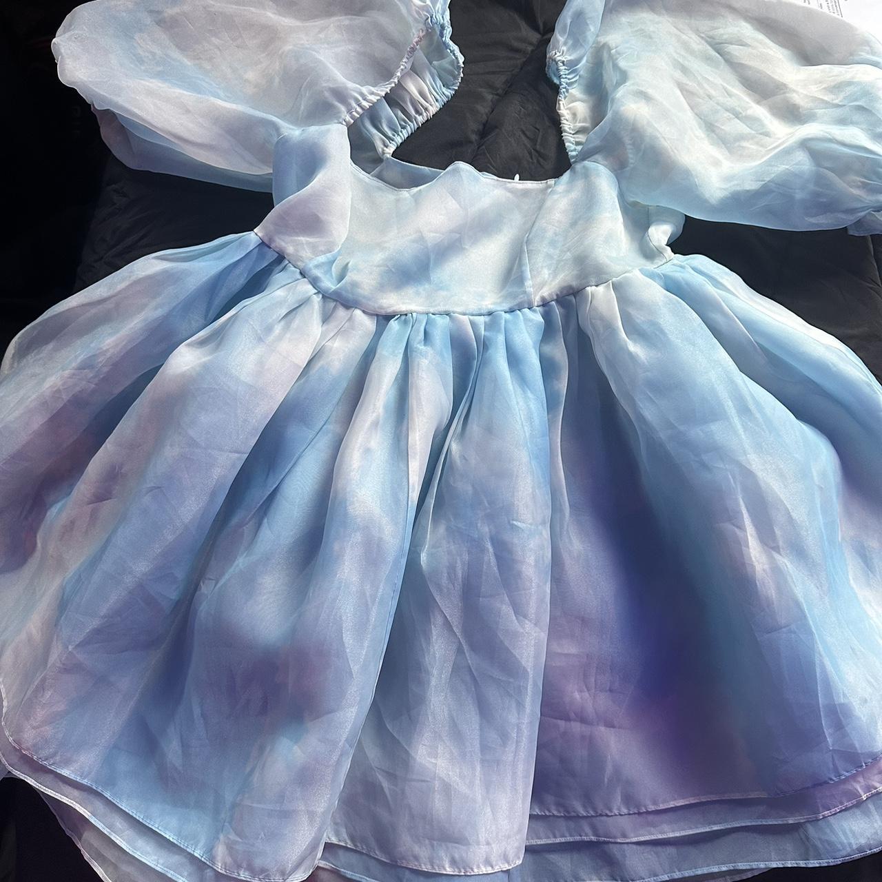 selkie dress fits like a medium/large. It has some... Depop