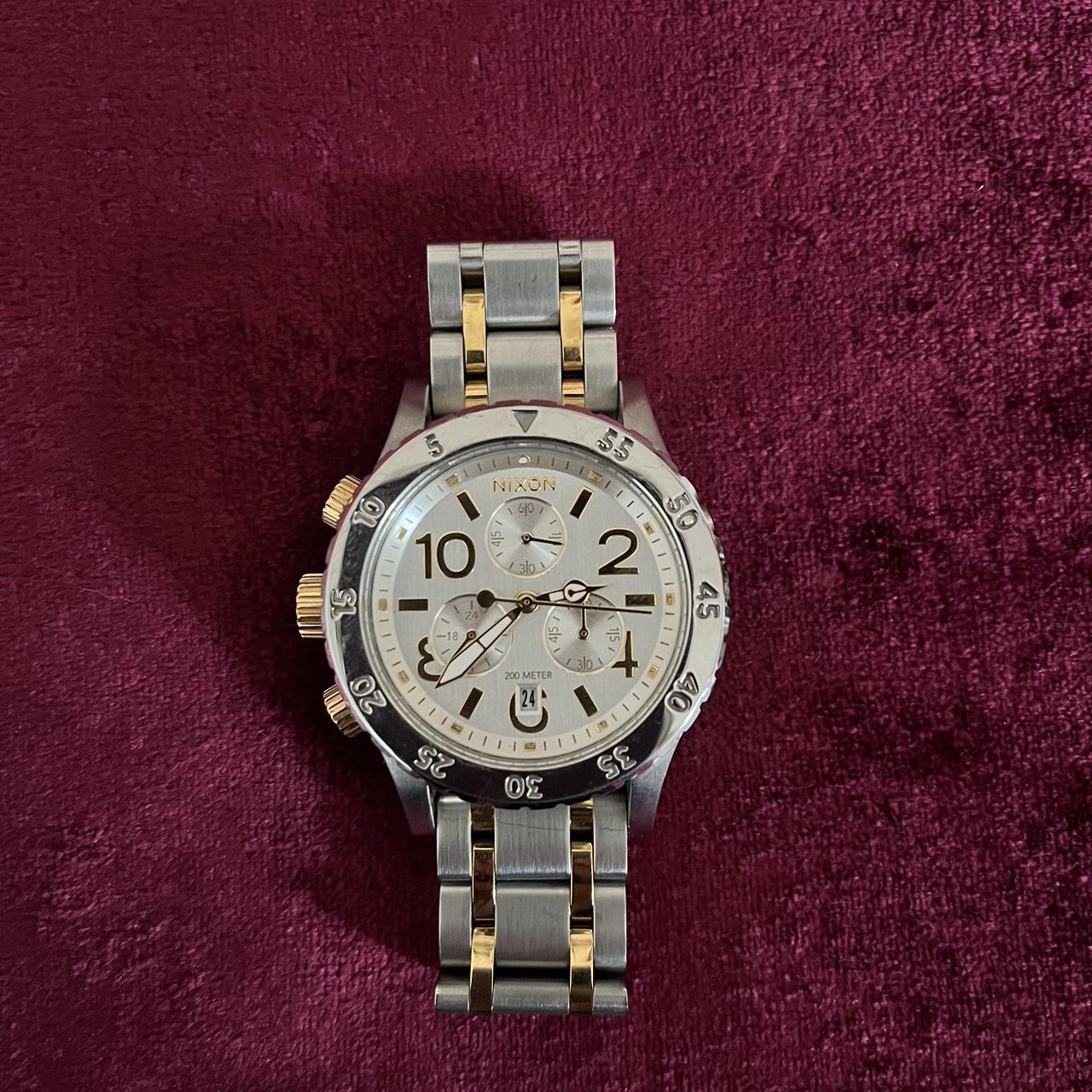 Nixon silver and gold watch best sale