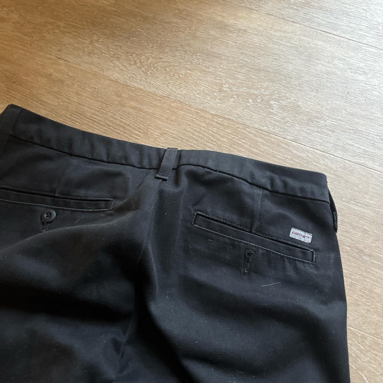 Women’s Carhartt trousers in black in 28 waist 32... - Depop