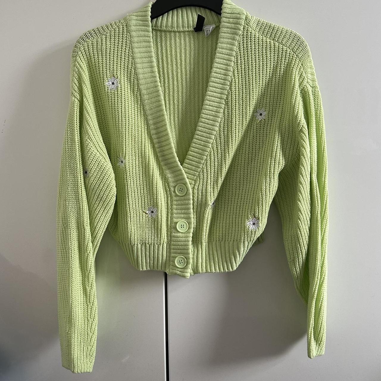 Knitted green cardigan with
