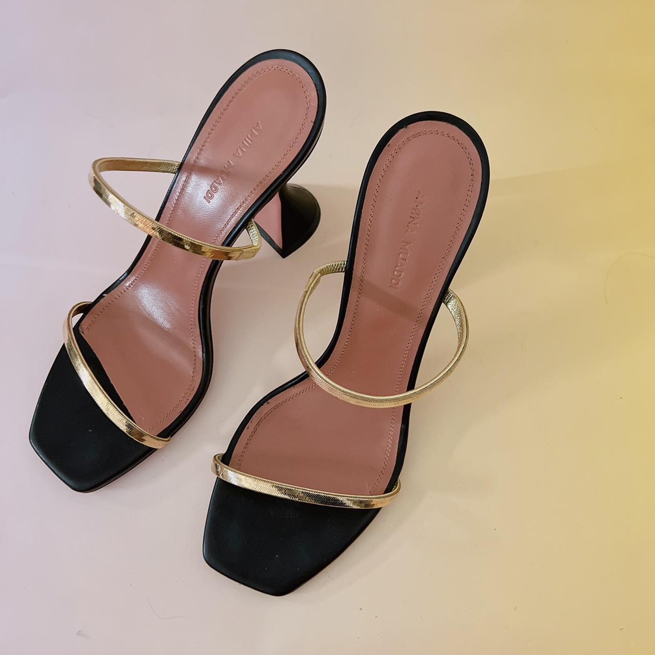 Amina Muaddi Gilda Heels in black leather with gold... - Depop