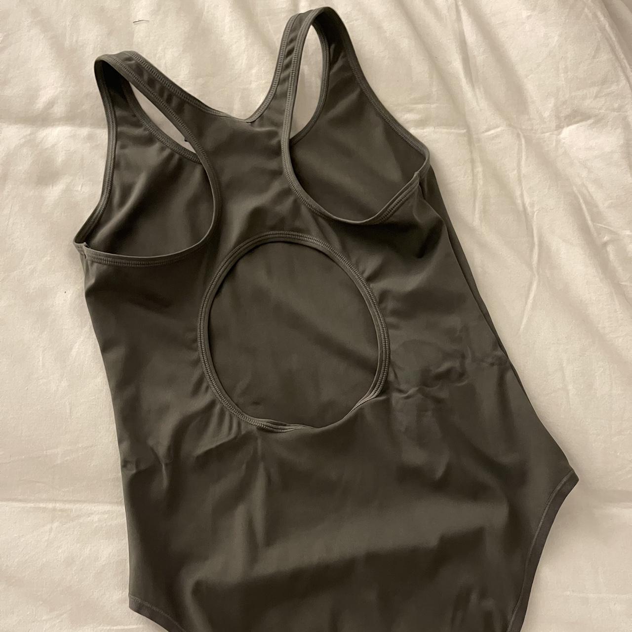 Skims dark brown body suit never worn - Depop