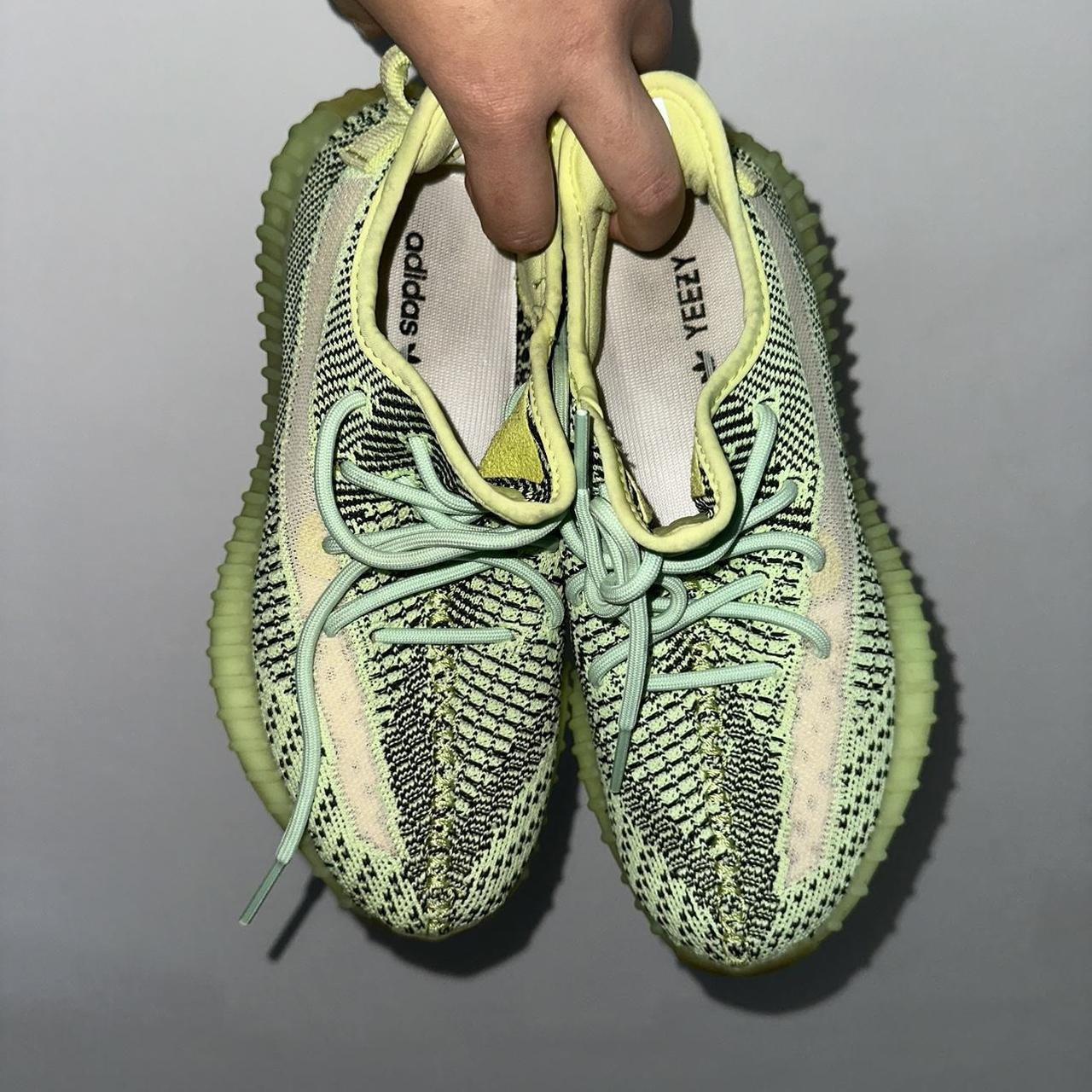 yeezy green on feet