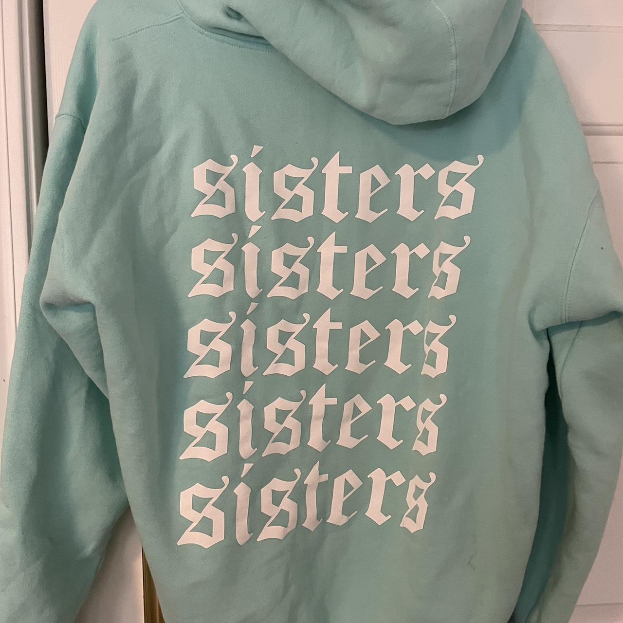 James charles light blue sisters hoodie hotsell