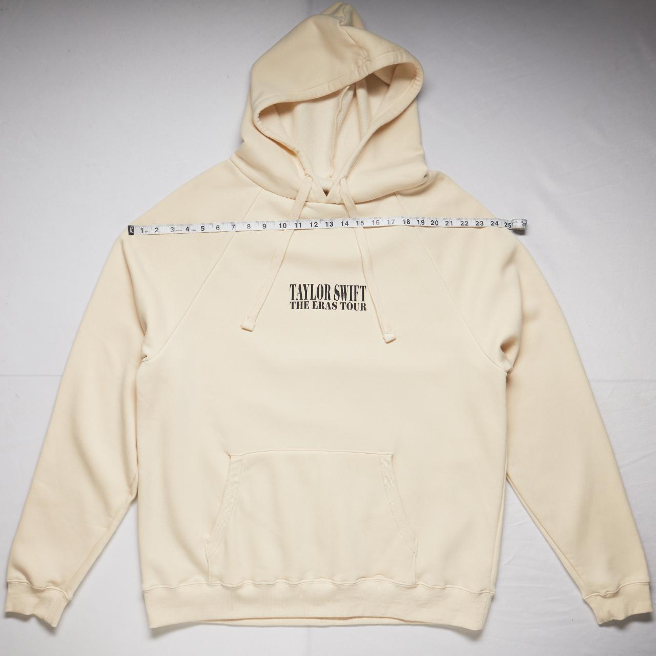 The Eras Tour フーディー Taylor Swift | The Eras Tour I Beige Hoodie – Taylor Swift
