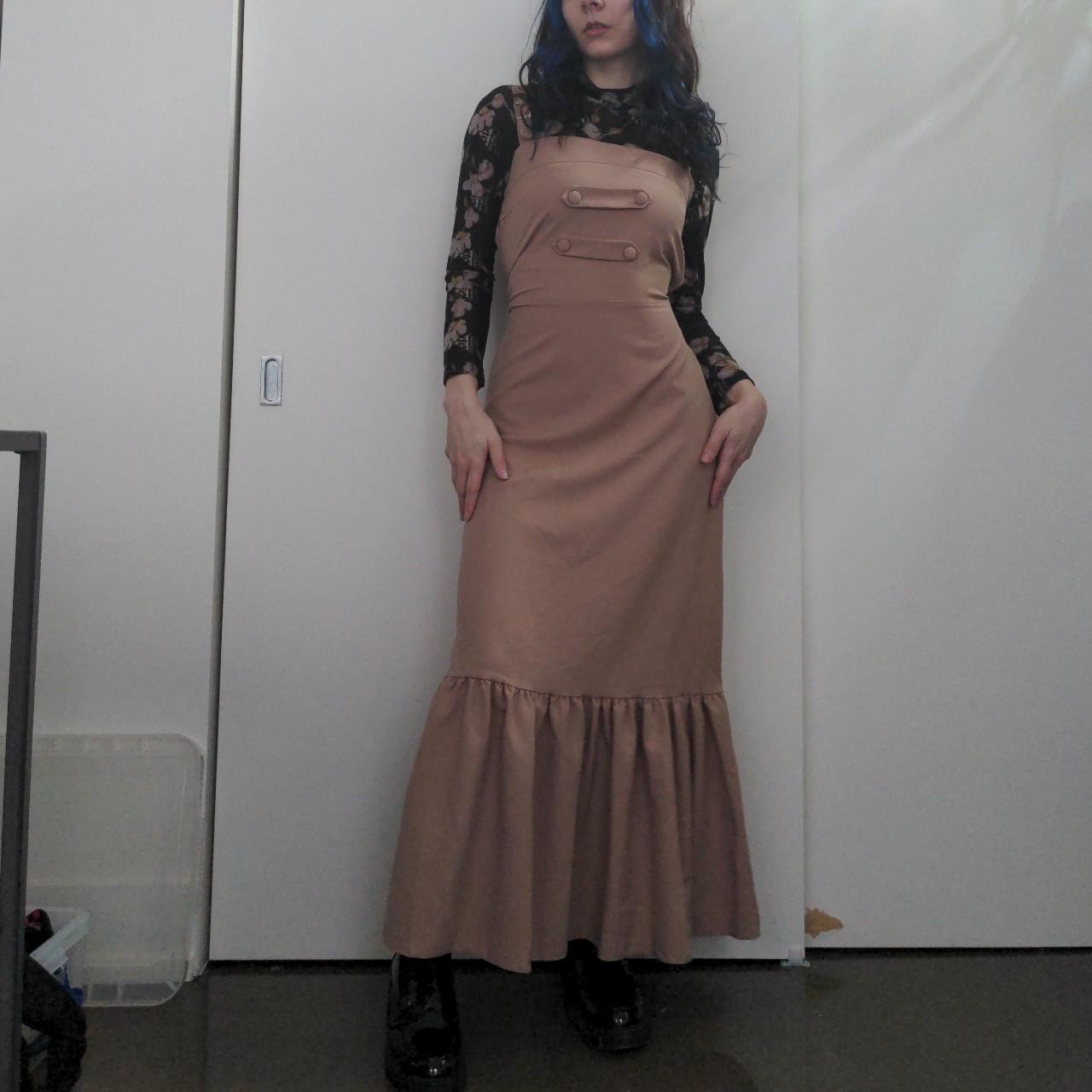 Super cute beige maxidress with button details on... - Depop