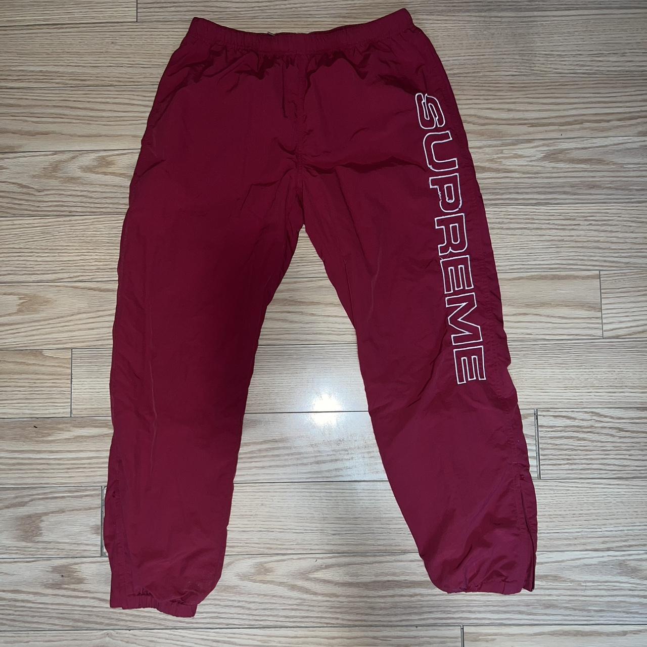 Supreme joggers red sale