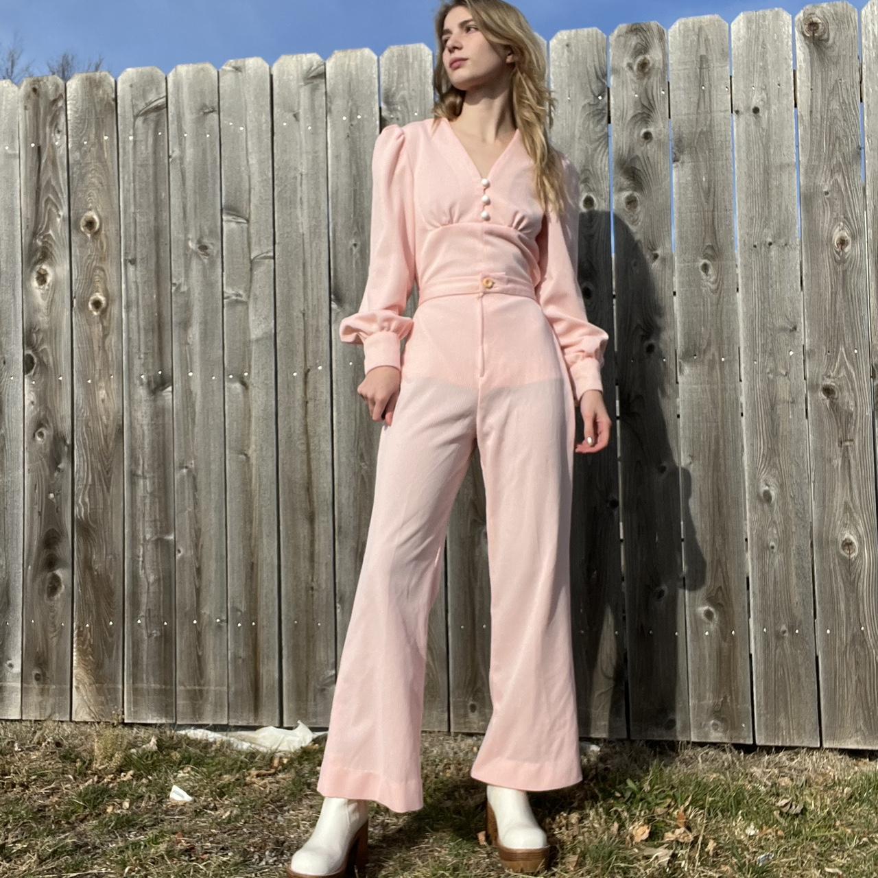 pink bell bottom jumpsuit